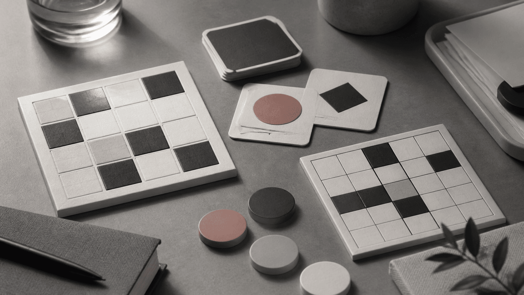 Editorial image of memory cards and brain game tiles on a neutral desk
